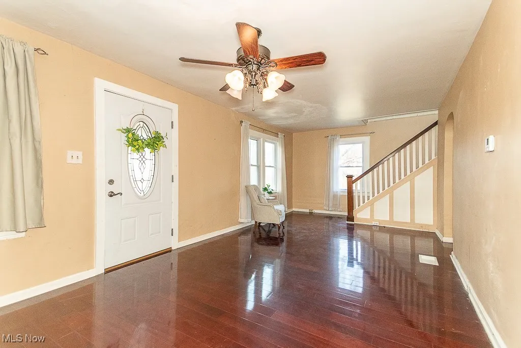 Living Room with beautiful floors and loaded with natural light