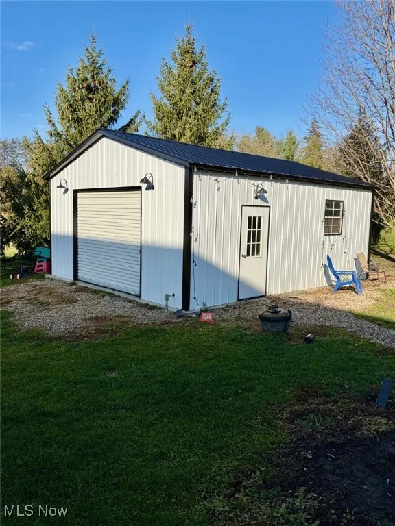 Detached garage with driveway