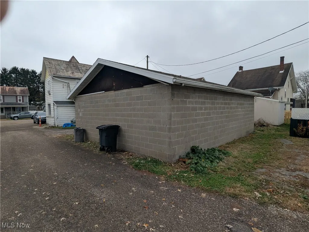 View of back of concrete block double garage