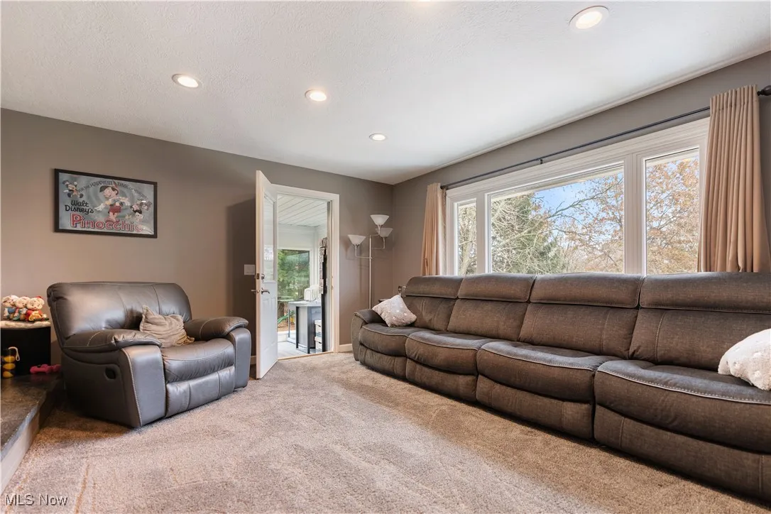 The 15x13 living room gives additional space to entertain and offers an over-sized window.