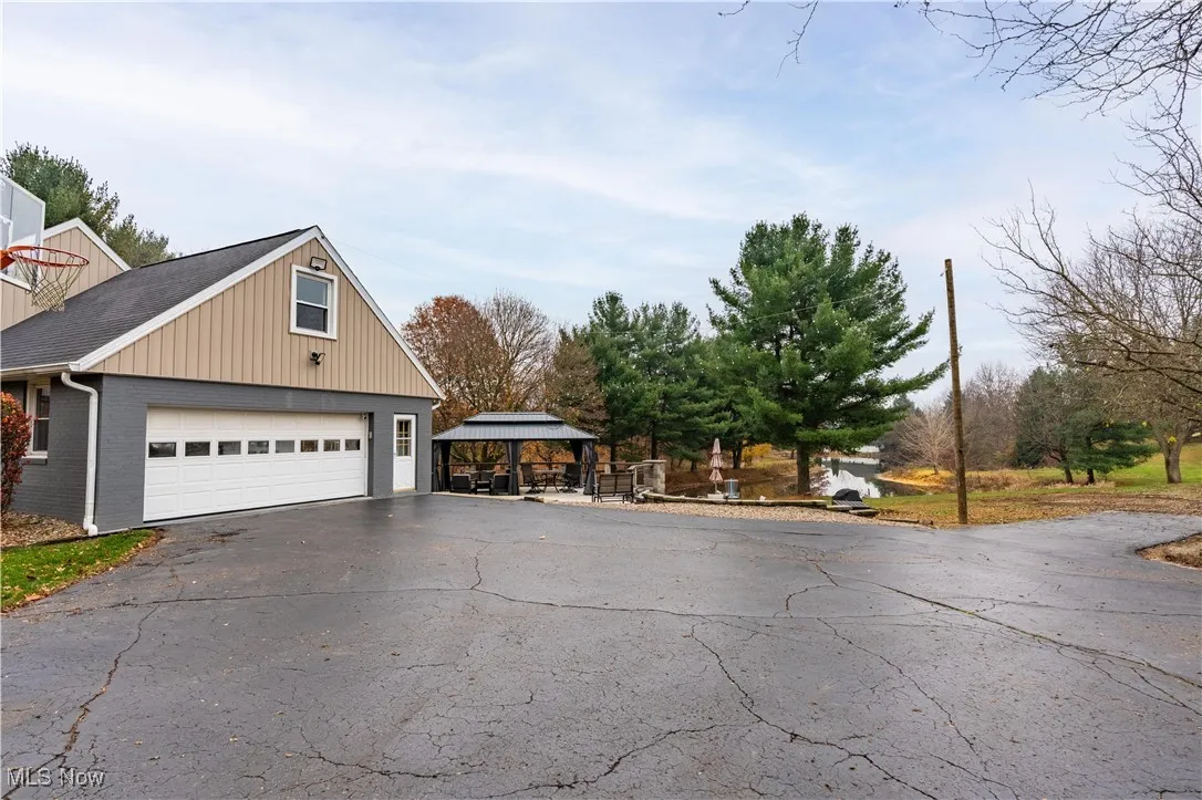 Side entry attached garage with a separate man-door.