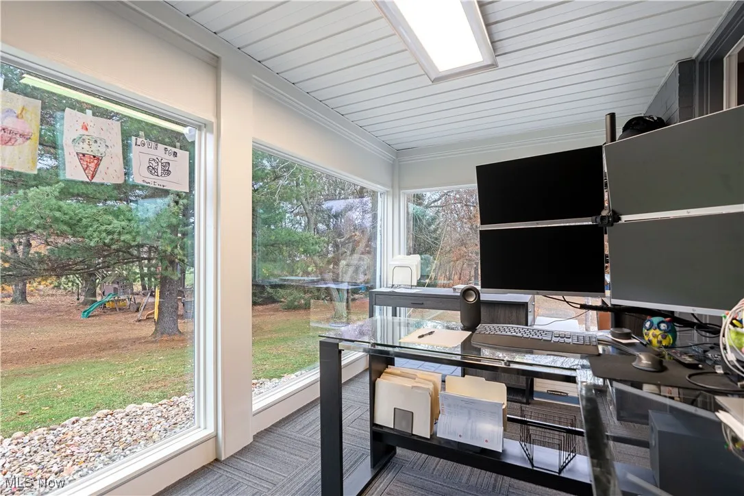 Floor to ceiling windows provide a lovely view.