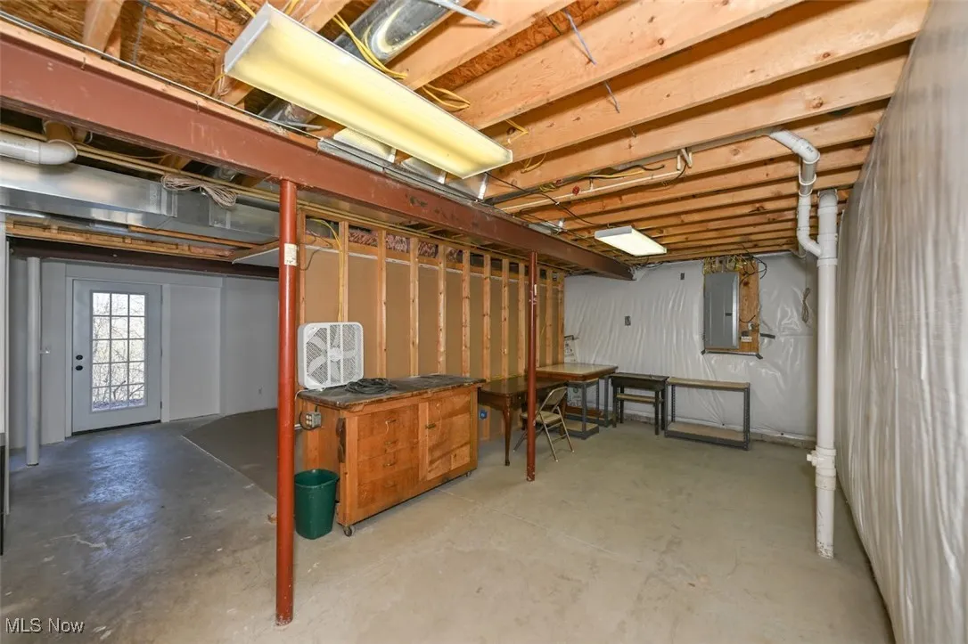 Basement space in lower level featuring electric panel
