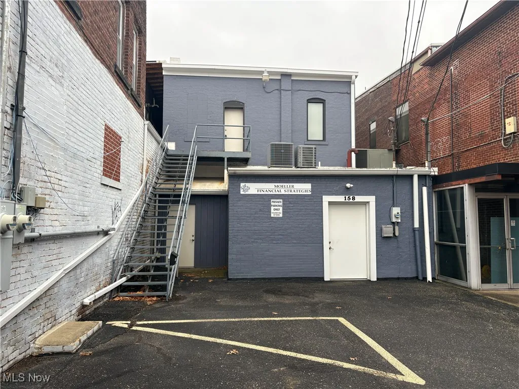 View of building exterior with stairs