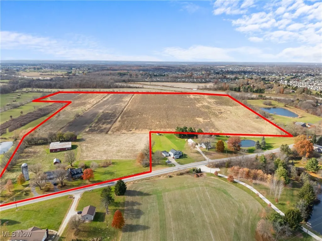 Overview of rural landscape featuring property boundaries highlighted