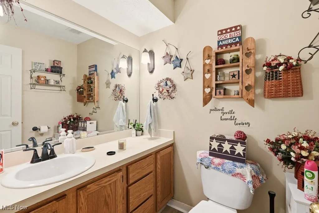 FIRST FLOOR HALF BATHROOM.