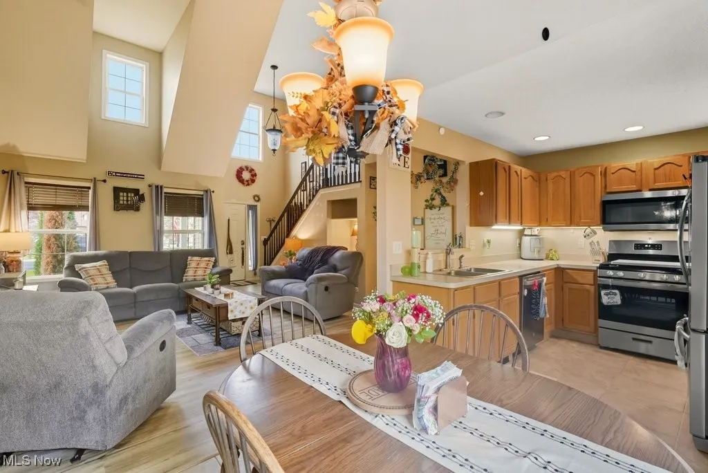 DINING AREA WITH SIGHT LINES OF THE KITCHEN AND LIVING ROOM.