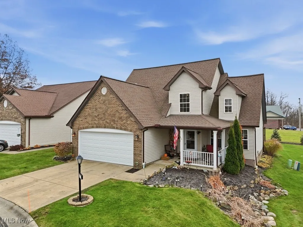 FRONT VIEW 1. CHARMING CAPE STYLE CLUSTER HOME.