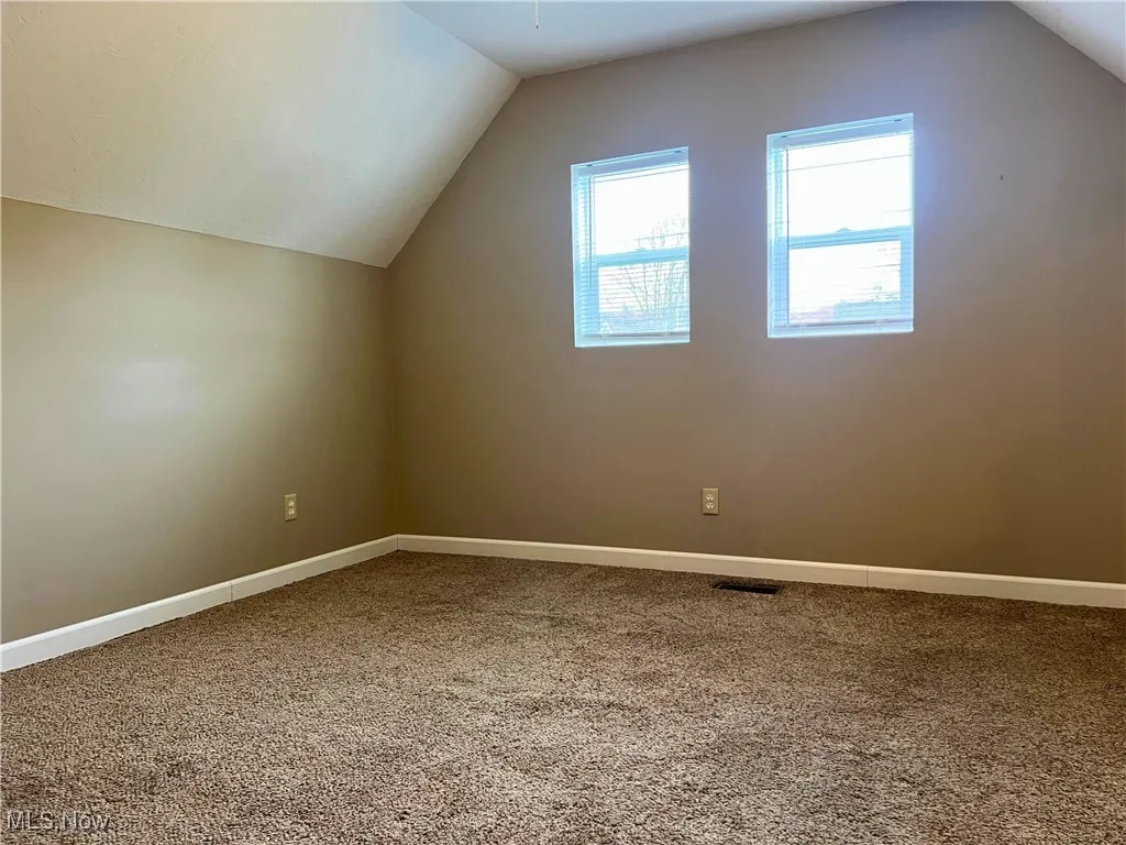 Room featuring ceiling and carpet