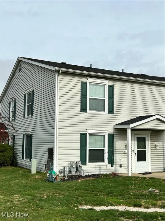 Front view of house with a yard