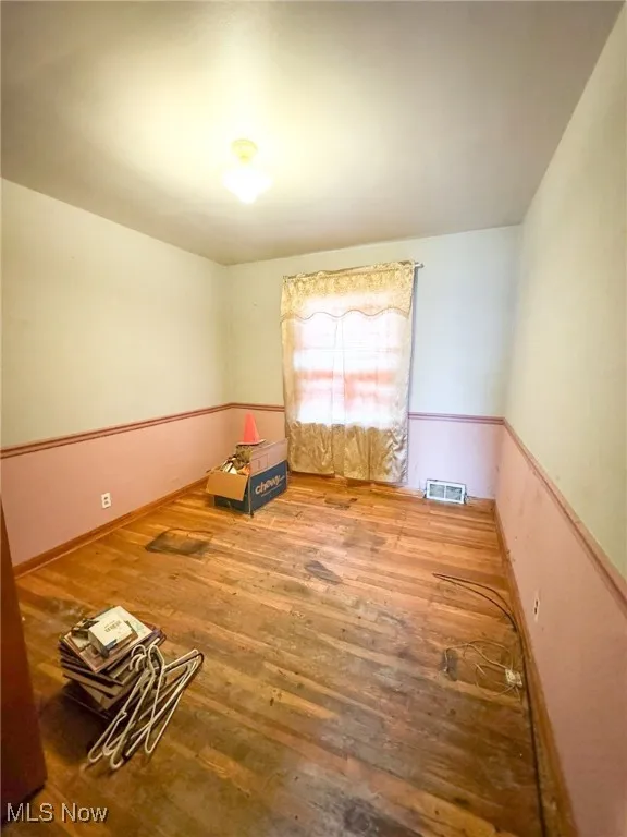 Spare room with light wood finished floors