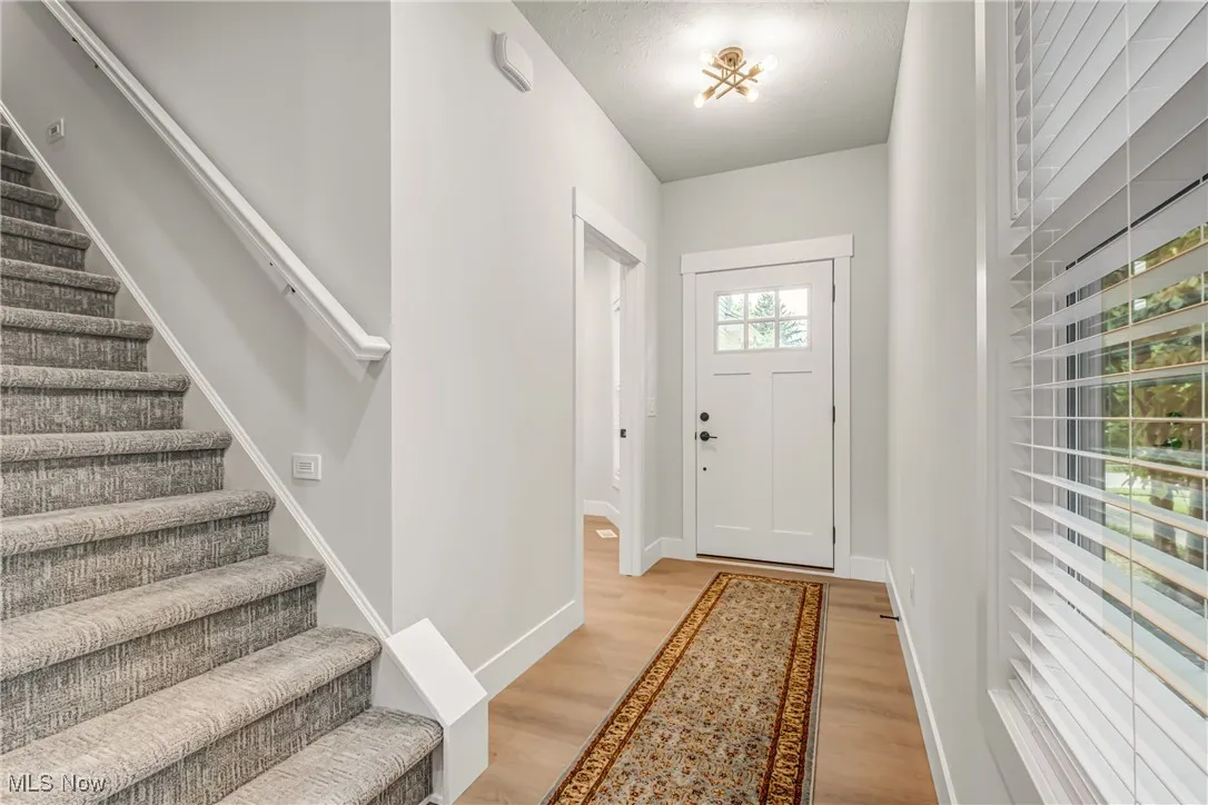 Entryway with light wood-type flooring