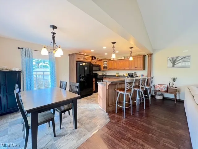 Dining space featuring a chandelier, recessed lighting, and light wood-type flooring