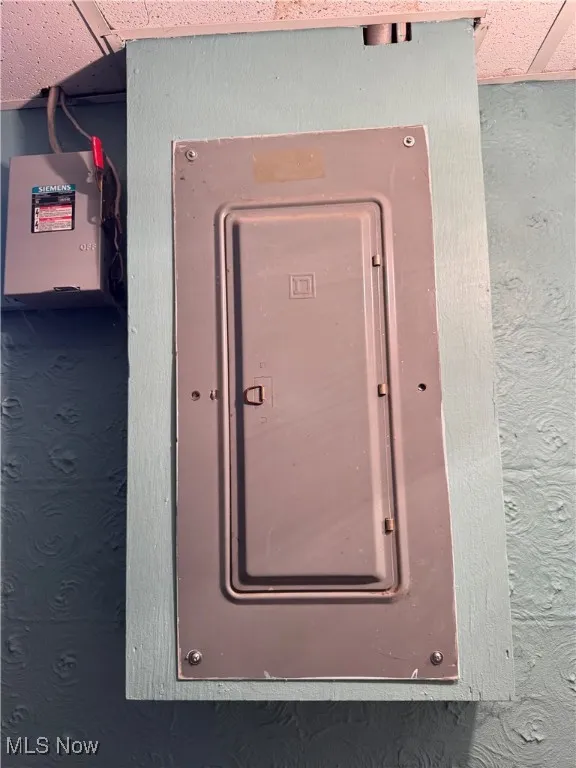 Utility room with electric panel