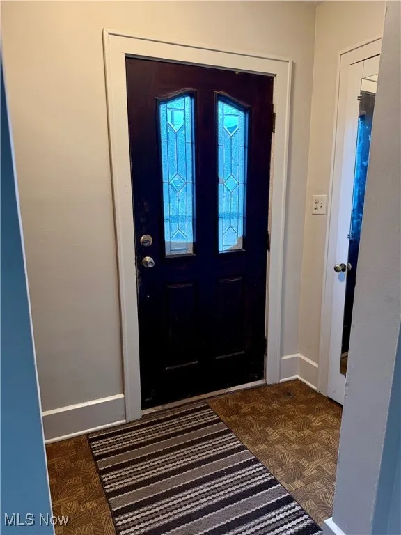 Entryway with baseboards