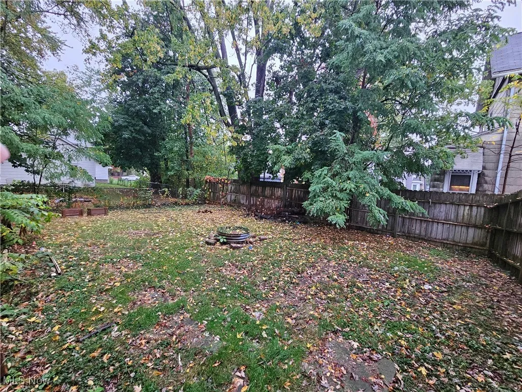 View of fenced backyard