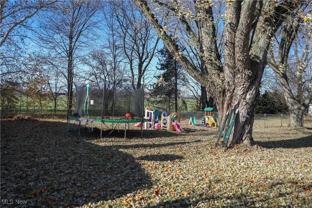 Communal playground featuring a trampoline