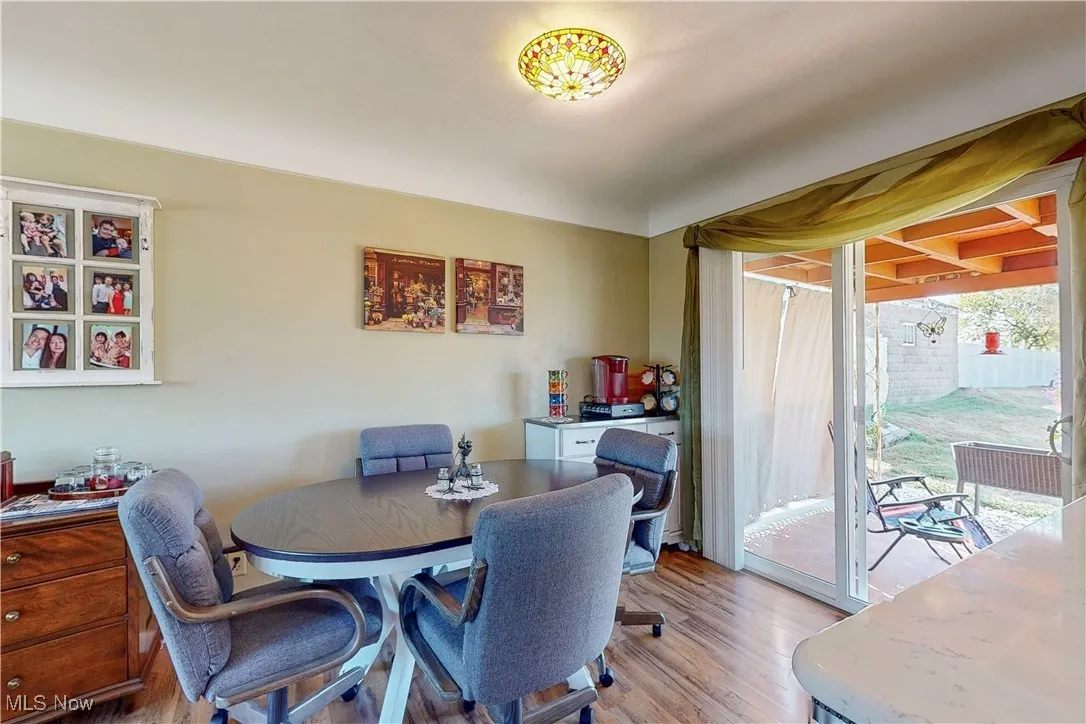 Dining space featuring wood finished floors