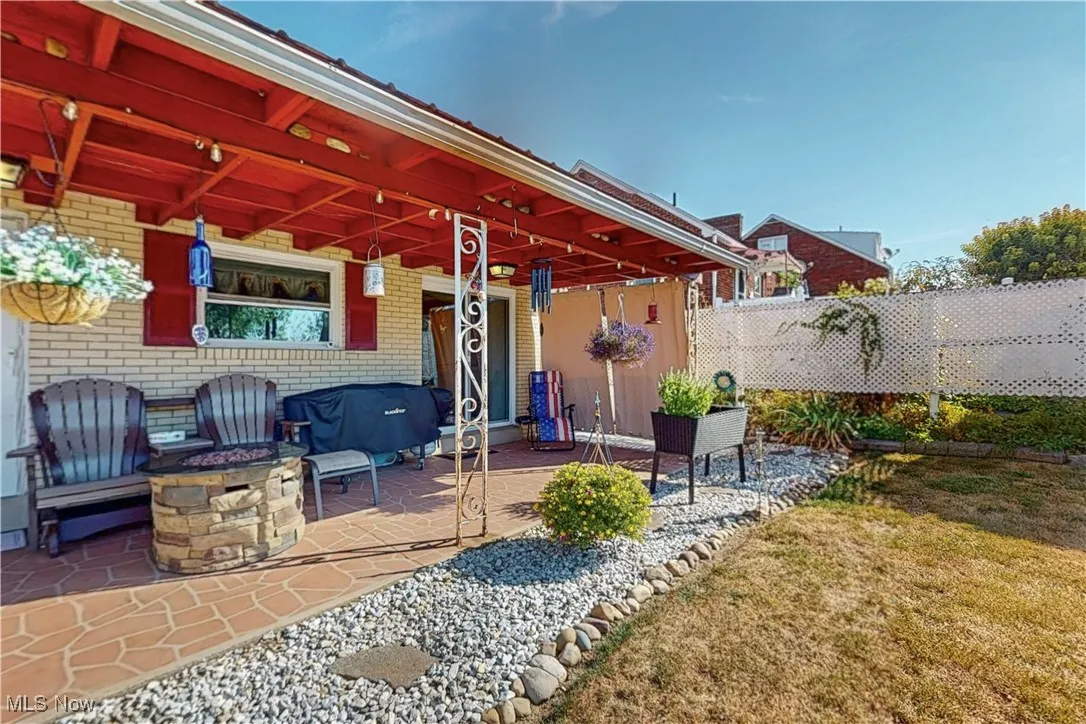 View of patio / terrace with a fire pit