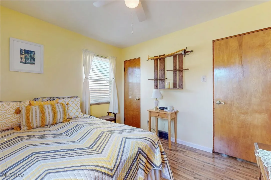Bedroom featuring light wood-style floors and ceiling fan