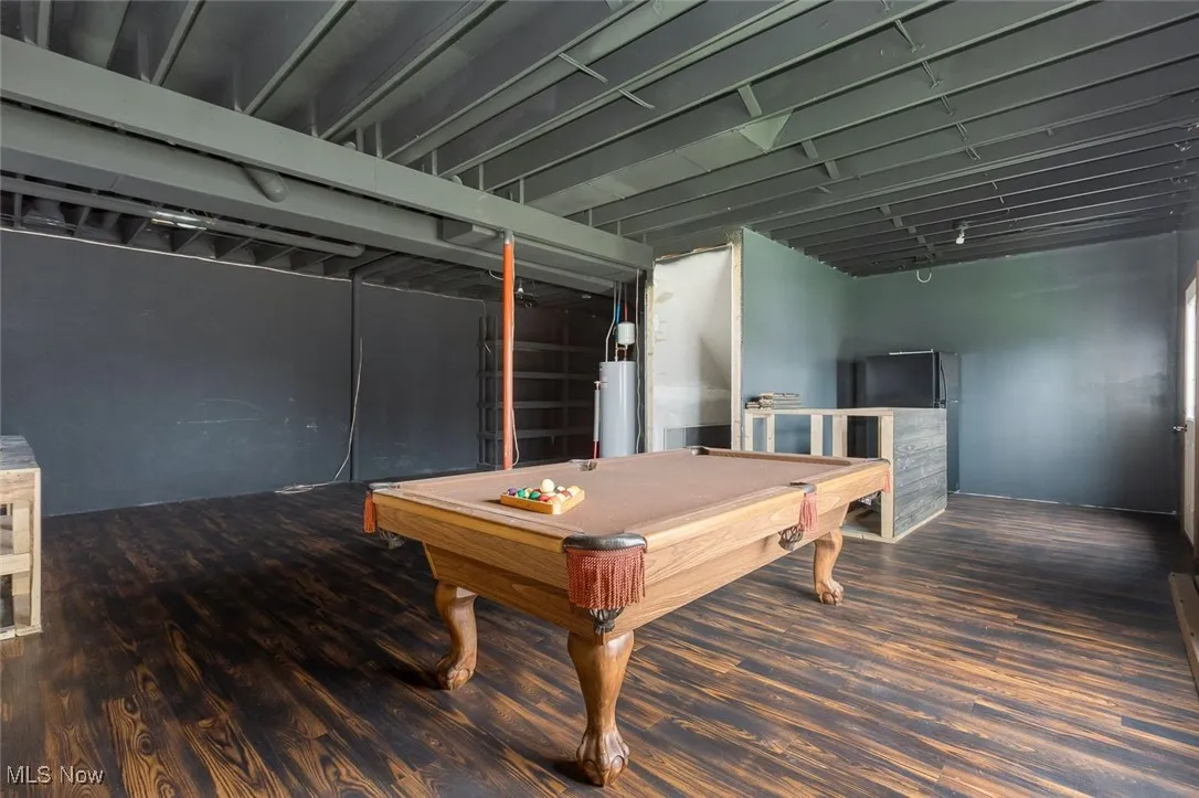 Recreation room featuring billiards and water heater