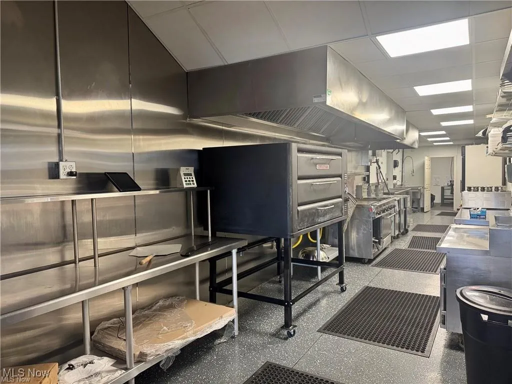 Laundry area featuring a drop ceiling