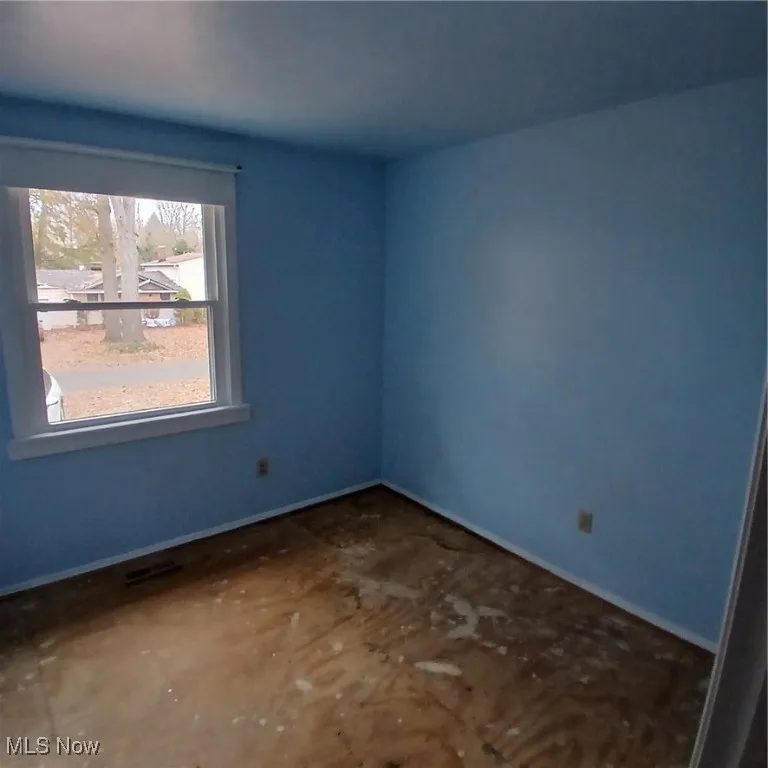 Empty room with baseboards