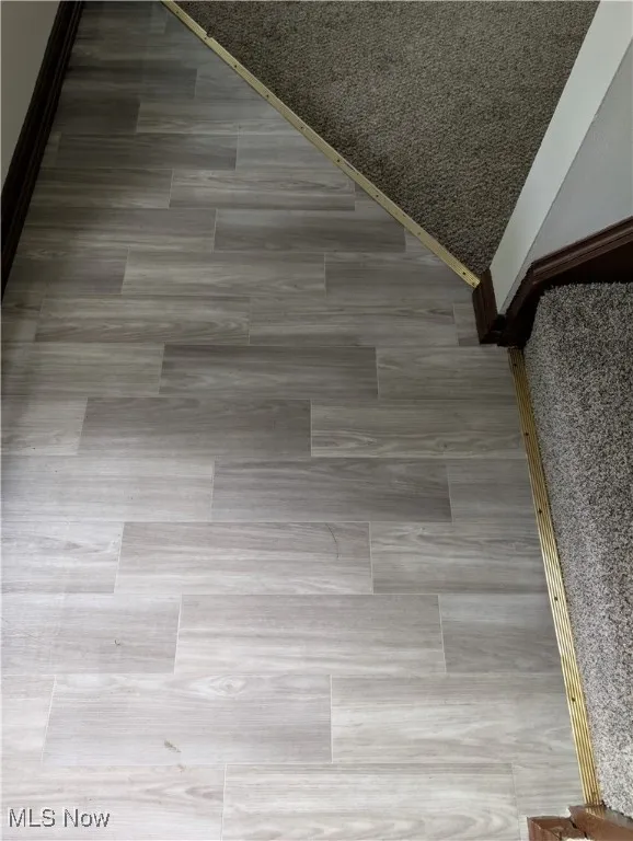 595 Dayton St Akron OH 44310 is a one bedroom townhouse in the North Hill area with a deck, storm door, basement, Living Room, Kitchen & entry on the 1st floor and the bedroom, bathroom and large oversized closet are on the 2nd floor. Recently replaced windows and siding  on the exterior and remodeled interior with new flooring, kitchen and bathroom. $750 per month plus electric by tenant. The landlord has provided trash pickup and off street parking lot. Property is just off Tallmadge Ave with easy access to Route 8.