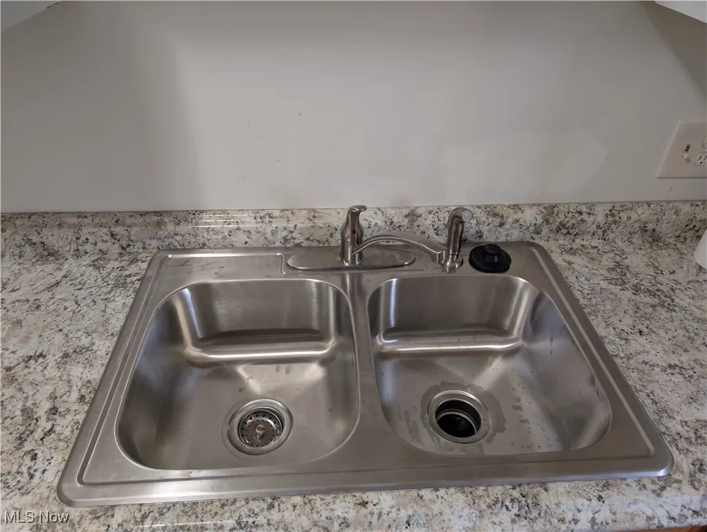 595 Dayton St Akron OH 44310 is a one bedroom townhouse in the North Hill area with a deck, storm door, basement, Living Room, Kitchen & entry on the 1st floor and the bedroom, bathroom and large oversized closet are on the 2nd floor. Recently replaced windows and siding  on the exterior and remodeled interior with new flooring, kitchen and bathroom. $750 per month plus electric by tenant. The landlord has provided trash pickup and off street parking lot. Property is just off Tallmadge Ave with easy access to Route 8.