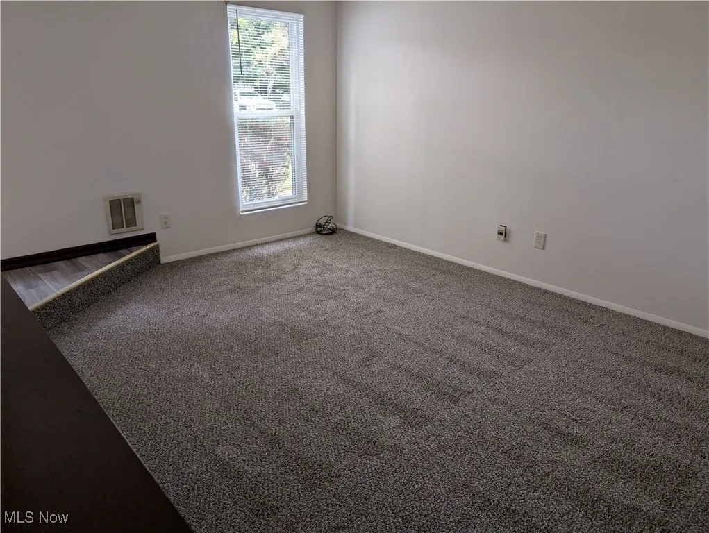 595 Dayton St Akron OH 44310 is a one bedroom townhouse in the North Hill area with a deck, storm door, basement, Living Room, Kitchen & entry on the 1st floor and the bedroom, bathroom and large oversized closet are on the 2nd floor. Recently replaced windows and siding  on the exterior and remodeled interior with new flooring, kitchen and bathroom. $750 per month plus electric by tenant. The landlord has provided trash pickup and off street parking lot. Property is just off Tallmadge Ave with easy access to Route 8.