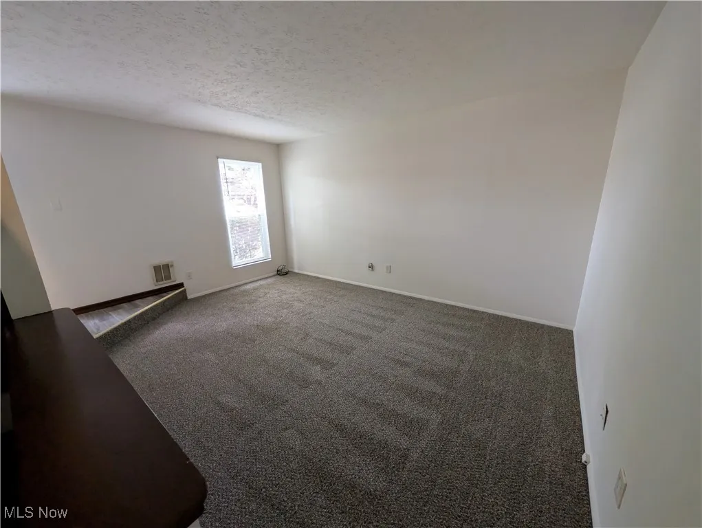 595 Dayton St Akron OH 44310 is a one bedroom townhouse in the North Hill area with a deck, storm door, basement, Living Room, Kitchen & entry on the 1st floor and the bedroom, bathroom and large oversized closet are on the 2nd floor. Recently replaced windows and siding  on the exterior and remodeled interior with new flooring, kitchen and bathroom. $750 per month plus electric by tenant. The landlord has provided trash pickup and off street parking lot. Property is just off Tallmadge Ave with easy access to Route 8.