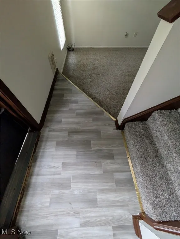 595 Dayton St Akron OH 44310 is a one bedroom townhouse in the North Hill area with a deck, storm door, basement, Living Room, Kitchen & entry on the 1st floor and the bedroom, bathroom and large oversized closet are on the 2nd floor. Recently replaced windows and siding  on the exterior and remodeled interior with new flooring, kitchen and bathroom. $750 per month plus electric by tenant. The landlord has provided trash pickup and off street parking lot. Property is just off Tallmadge Ave with easy access to Route 8.