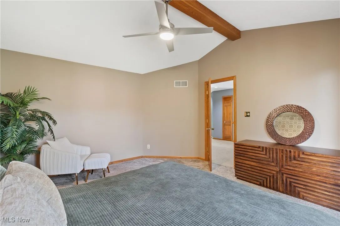 Sitting room with carpet floors and ceiling fan