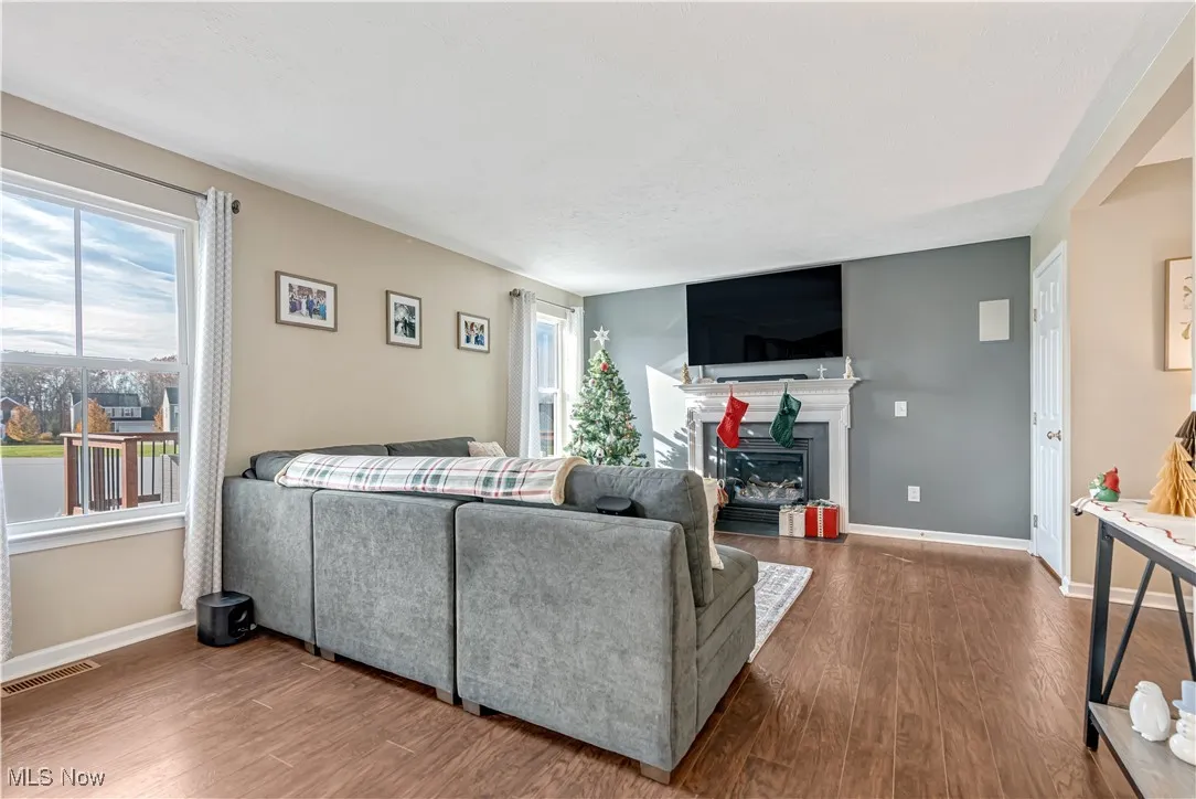 Living Room offers a lot of natural light and is wired for sound