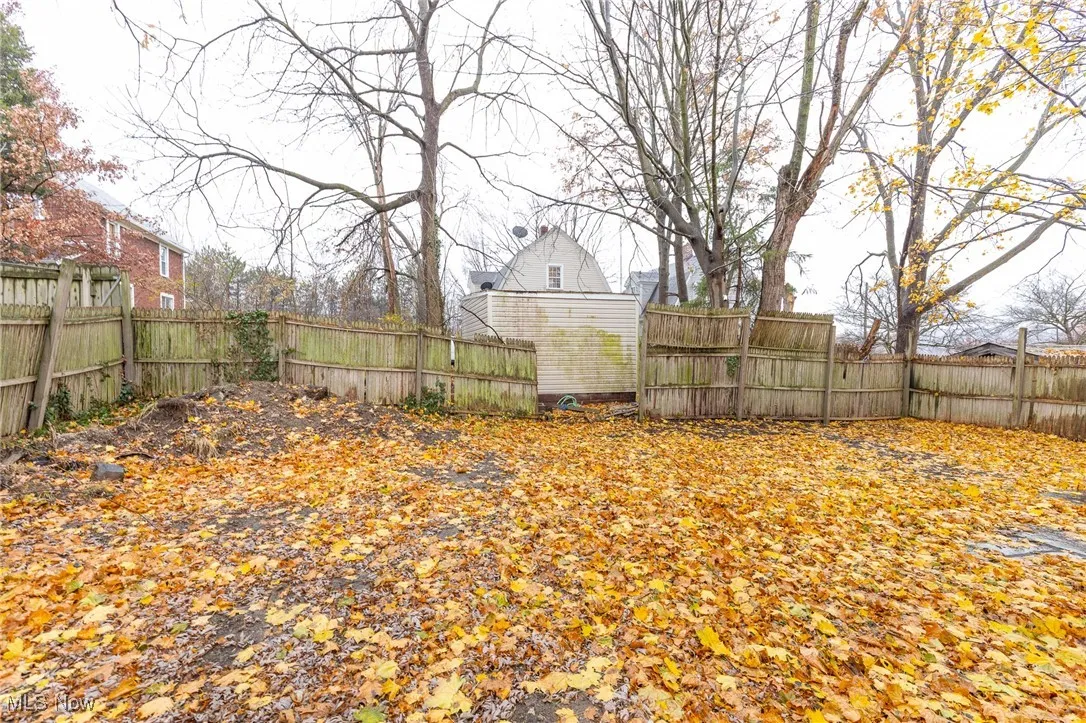 View of fenced backyard