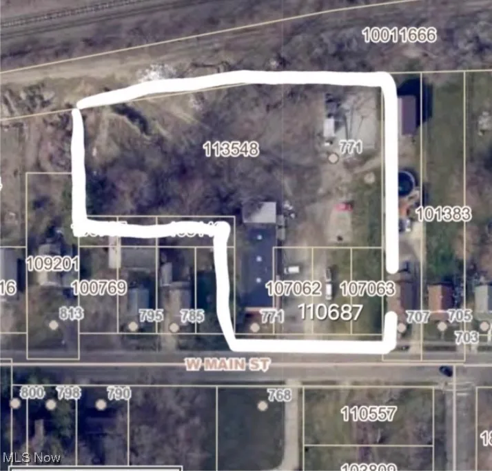 Aerial overview of property's location featuring property parcel outlined