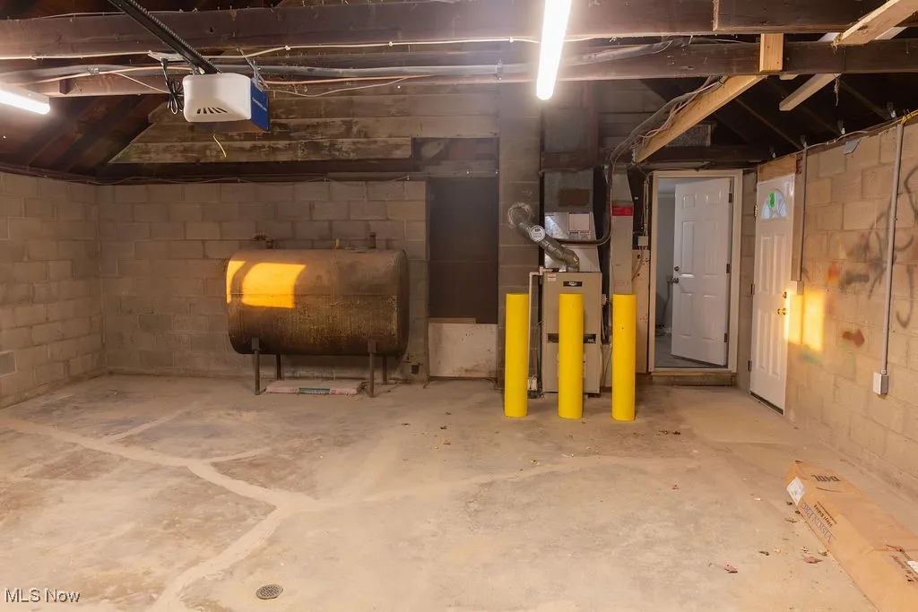 Below grade area featuring heating fuel and heating unit