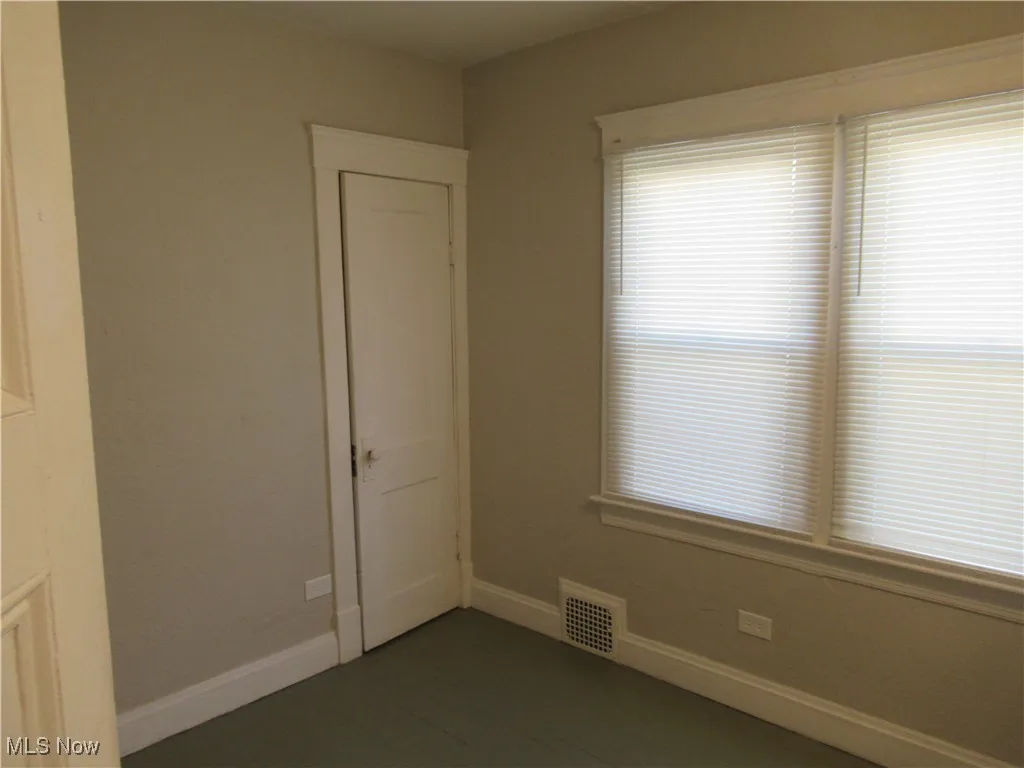 Spare room with baseboards