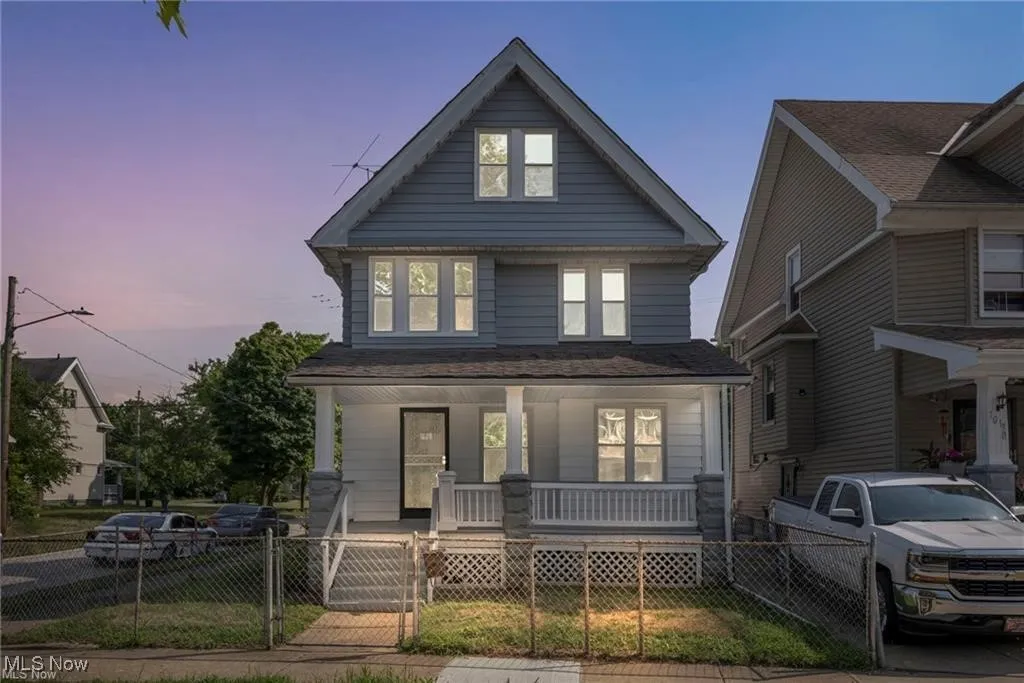 View of front of house with covered porch