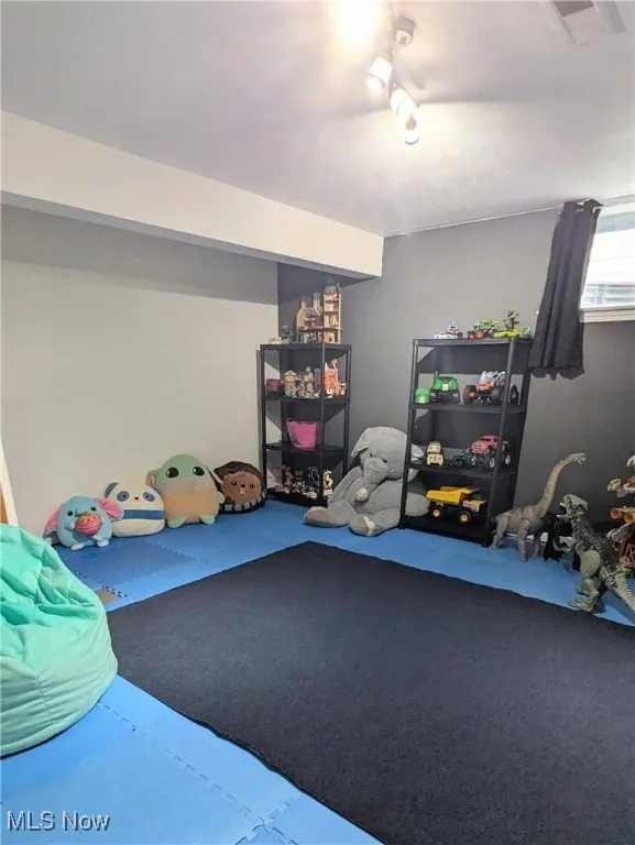 View of 4th Bedroom, Office, Play or Exercise Room with Large Walk In Closet, Modern Paint, Interlocking Flooring and Window Treatment