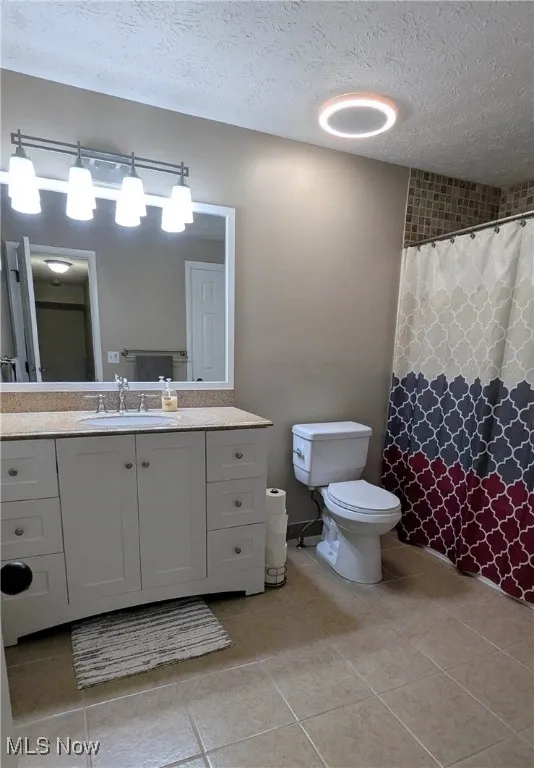 View of Updated Full Bath with Granite Top and Bluetooth Speakers/Light/Fan