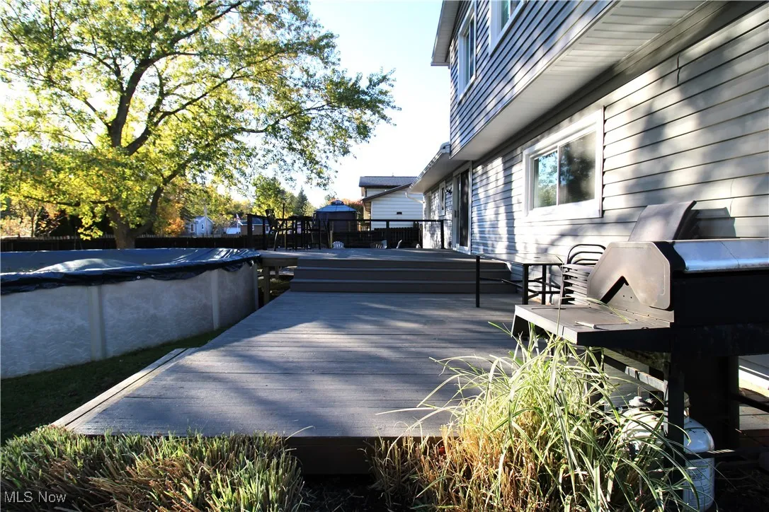 View of Back of Home, Two Tier Deck and Newer Above Ground Pool