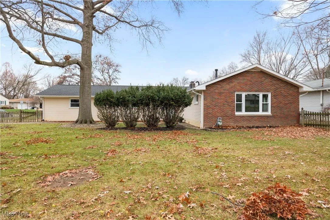 View of home's exterior featuring brick siding