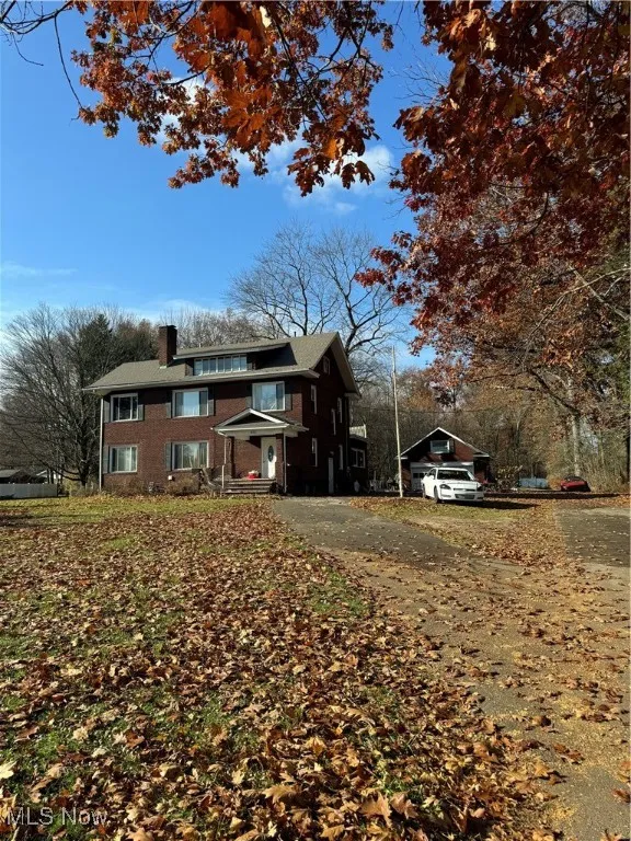 View of front facade with a chimney
