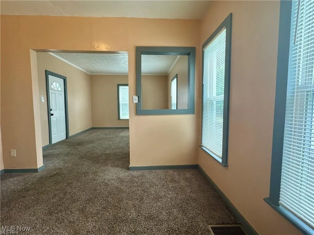 Dining room looking into living room