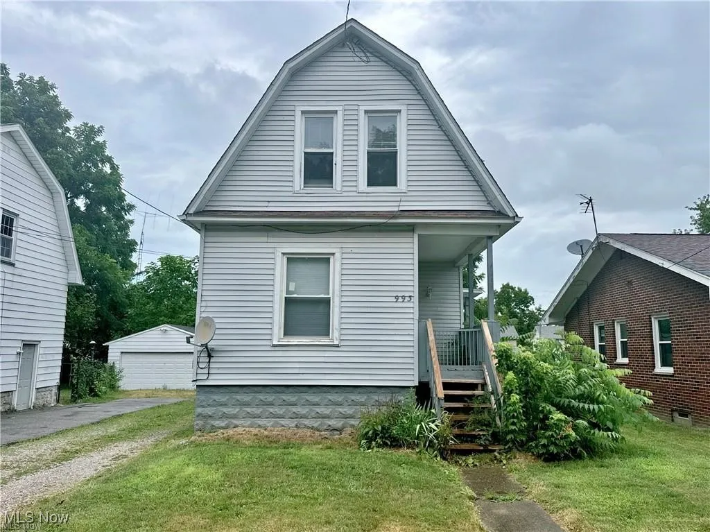 Front of the property showing driveway and porch