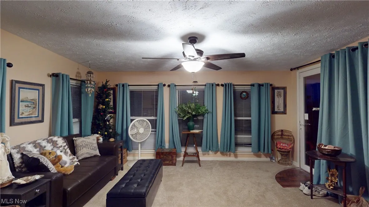 SUNROOM TO THE BACK OF THE DECK