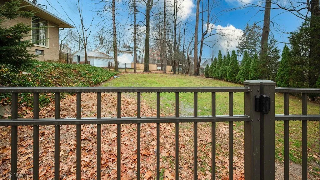 View of fenced backyard