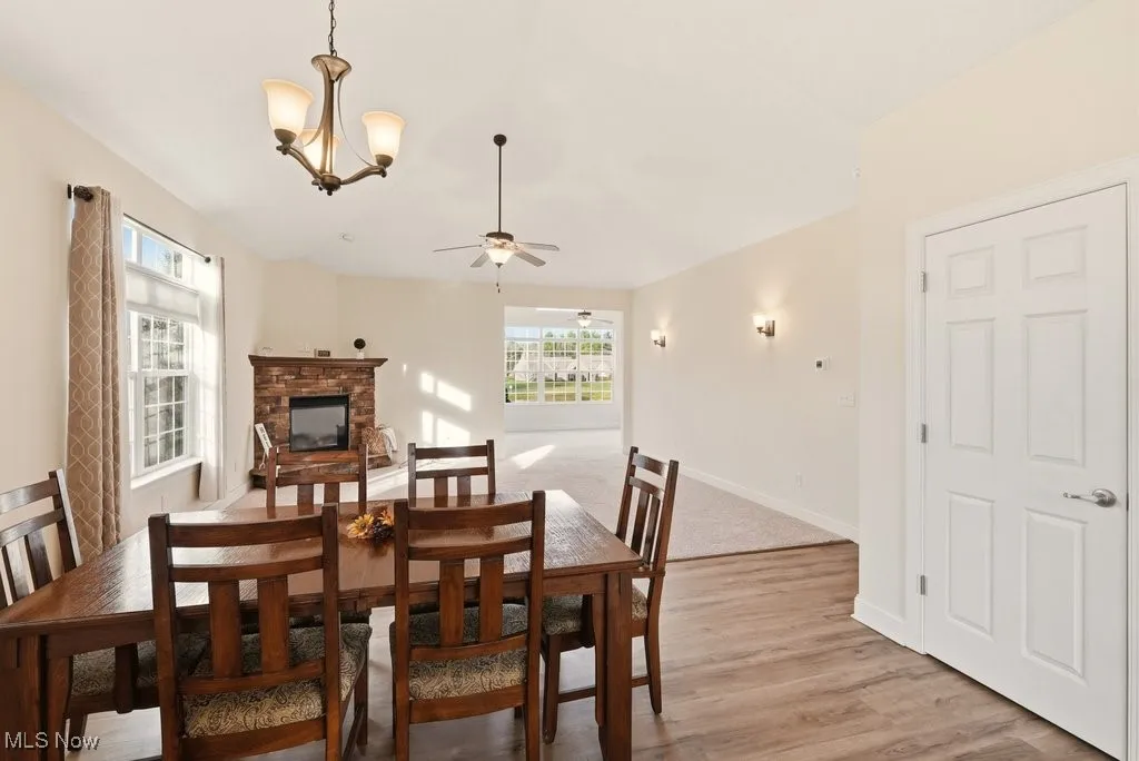 Dining area featuring a chandelier, and light wood finished floors