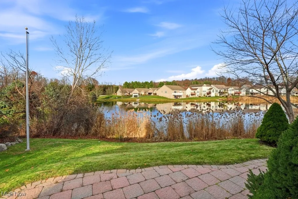 Water view with nearby suburban area